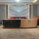 Two-Tone Curved TV Stand with White Marble Top and High-Gloss Wood Panels